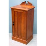 Walnut bedside cupboard