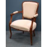 French style beech framed and upholstered open armchair Upholstery in good order, front legs with