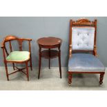 Walnut framed blue upholstered button back nursing chair, mahogany two tiered occasional table and a