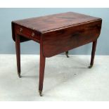 Mahogany Pembroke table with single drawer on brass castors