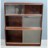 Mahogany veneered three section bookcase with glass sliding doors