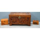 Carved camphorwood trunk, gilt framed mirror and two similar boxes