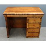 Coromandel veneered desk with four drawers