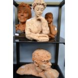 Pottery bust of a woman and three others similar