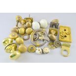 Quantity of brass and ceramic door knobs