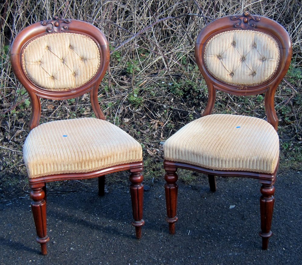 Set of six 19th century mahogany and upholstered balloon back dining chairs on turned legs