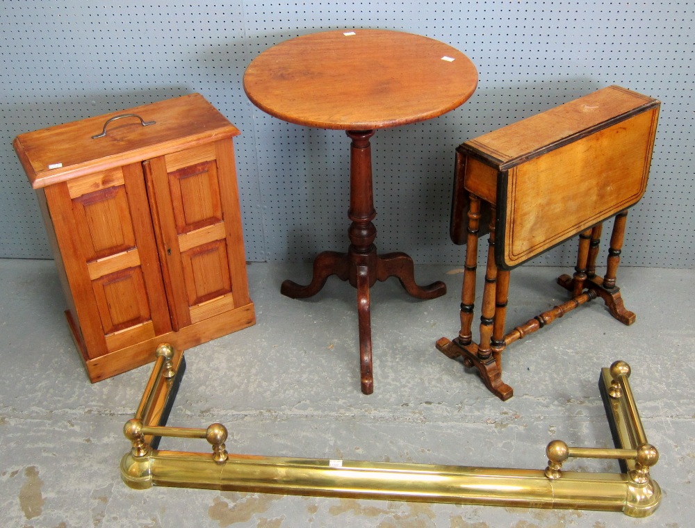 Pine cabinet with drawers a wine table a drop flap table and a brass fender