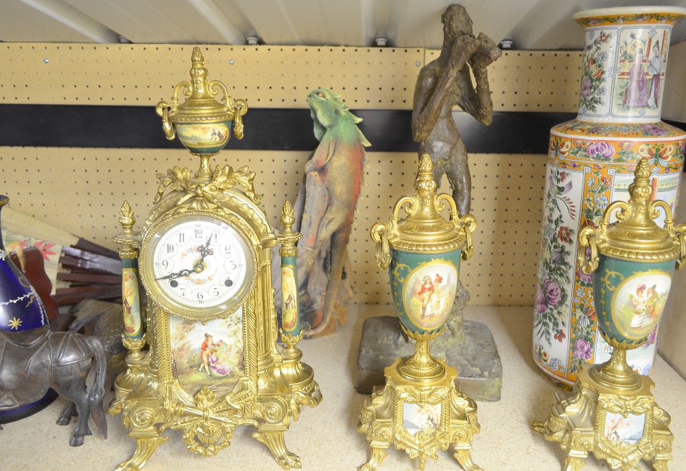 NOTE DECANTER WITHDRAWN FROM THIS LOT 20th Century clock garniture and a resin sculpture and other