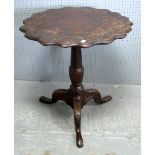 Carved oak table on tripod base