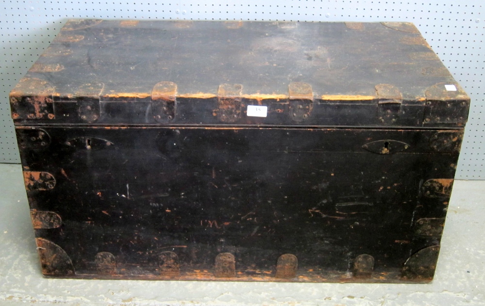 Wooden trunk with metal mounts and lead lined interior