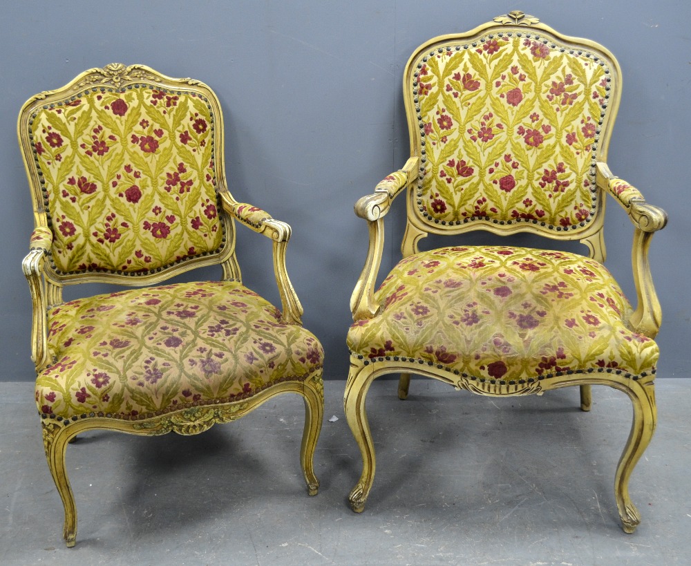 Pair of French style painted and upholstered armchairs