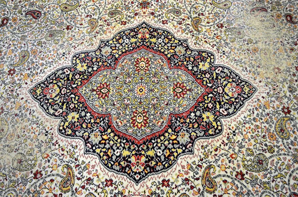 Large Persian cream ground carpet with central shaped medallion and floral motifs, multiple borders, - Image 2 of 7