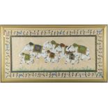 20th century Indian painting on silk depicting a group of elephants, framed with a floral border