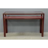 Pierre Vandel Paris Burgundy metal  and glass two tier  table 75cm h 128cm w 40cm d