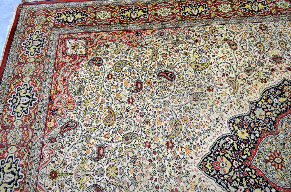 Large Persian cream ground carpet with central shaped medallion and floral motifs, multiple borders, - Image 4 of 7