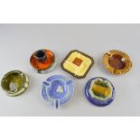 Six Early 20th century Doulton stone ware ash trays