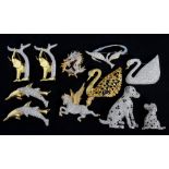 Eleven Swarovski crystal animal brooches to include swans, dogs, elphants and mythical creatures,