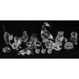 Twelve Swarovski crystal faceted cut animals to include a penguin, crab, cat, dog, hedgehog,