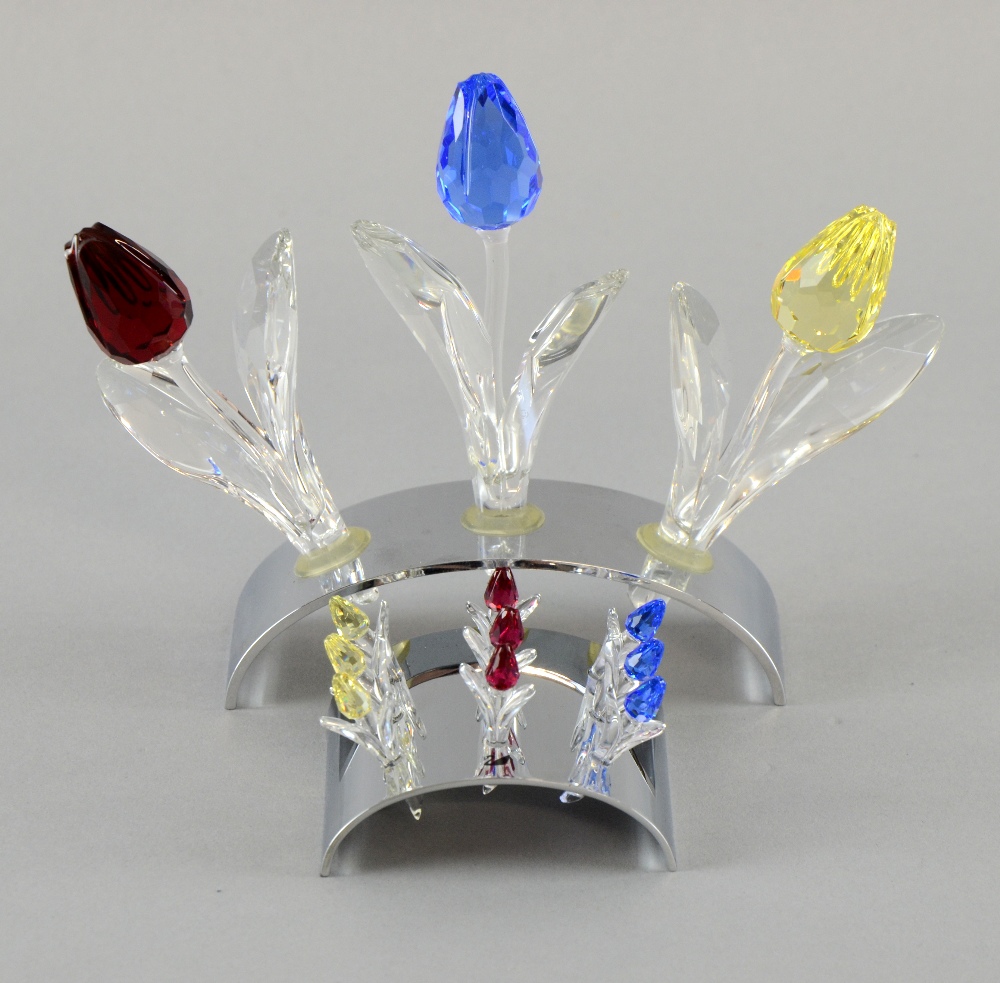 Swarovski crystal set of three coloured tulips, red, yellow and blue with display stand and nine