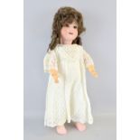 Heubach Koppelsdorf girl doll with sleeping blue eyes and  jointed body,  Impressed Heubach