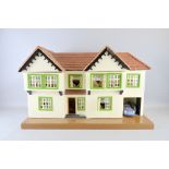 1970's doll's house, 71cm x 43cm x 28cm,Provenance:  From a single owner collection of over 300