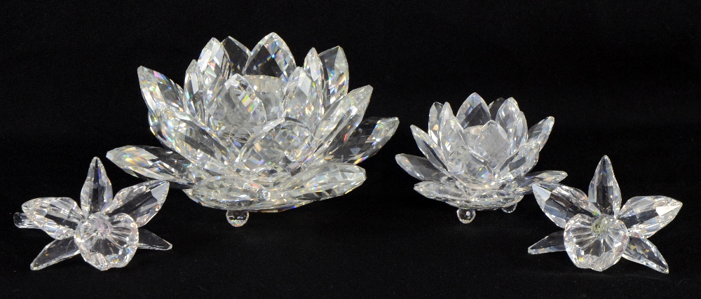 Two waterlily candle holders and two glass orchids, Swarovski silver crystal, boxed,