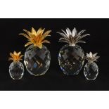 Swarovski crystal pineapple with smooth Rhodium leaves and another with hammered gold coloured