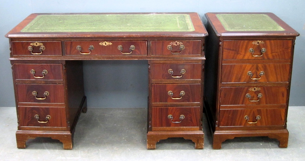 Reproduction mahogany pedestal desk with green and gilt tooled leather writing surface and a