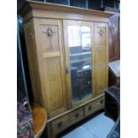 Oak wardrobeMirror silver worn in places and flecking, handle to drawer missing, general wear and