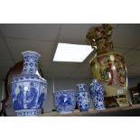 Japanese baluster vase and four Chinese blue and white vases of varying form,