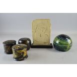 Three lacquered boxes glass paper weight and an Egyptian style ornament