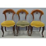 Set of eight 19th century mahogany balloon back dining chairs with padded seats on turned legs
