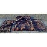 Persian carpet saddlebag  144cm by 107cm and two Persian carpet fragments,