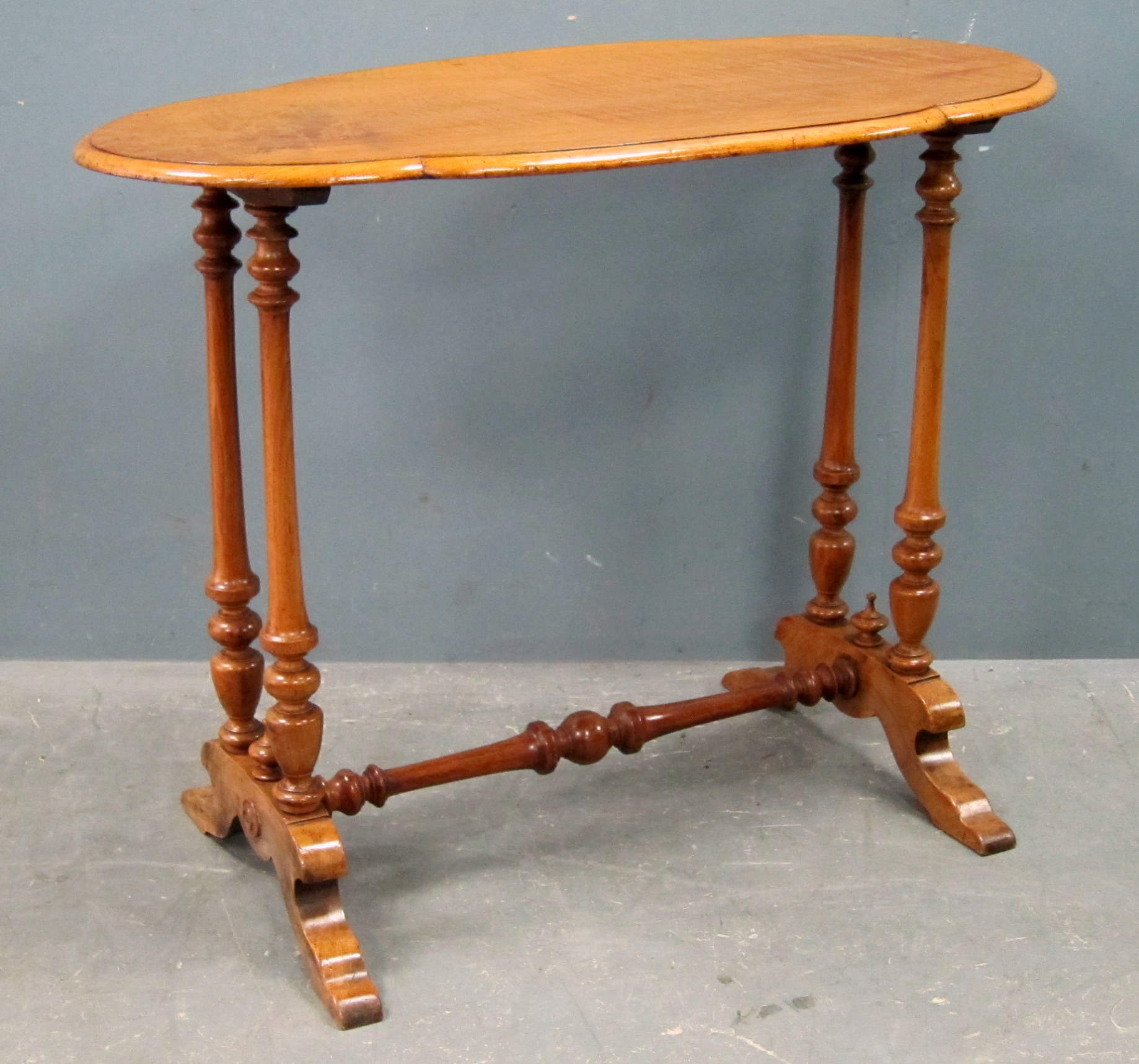 Late 19th  Early 20th century walnut shaped table on turned supports united by stretcher, 71cm x