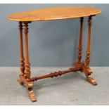 Late 19th  Early 20th century walnut shaped table on turned supports united by stretcher, 71cm x