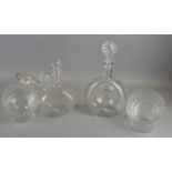 Baccarat decanter and other decanters and seven glass bowls