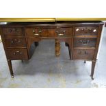 Mahogany serpentine side table with five drawers