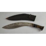 Gurkha Kukri with curved steel blade and horn mounted handle, in leather sheath with two smaller