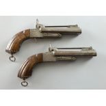 Two double barrelled approx 9mm pinfire boxlock pistols with approx 11.5cm barrels, with top mounted