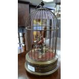 Wind song bird in cage Sings but does not move, feathers dusty and in poor condition