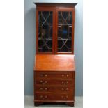 Early 20th century mahogany bureau bookcase, top with two glazed doors, with an album of '