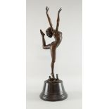 A contemporary bronze of a ballerina with hand in the air