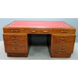 Art Deco desk   Mahogany veneered with two pedestals and  red leather tooled top, 77cm x 167cm x