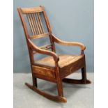 Mahogany framed rocking chair with single drawer to one side