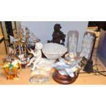 Carved hardstone bookends, models of ships, bronze figure, blanc de chine 'Cupid' ornament and a