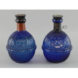 Pair of Hardens Fire Grenades in cobalt blue glass ribbed bulbous shape central band embossed Harden