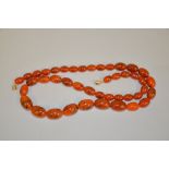 Orange bead necklace