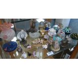 Small collection of glass paperweights, china animal figures, other items etc.,