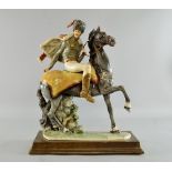 Italian military officer on horseback, titled 'Redqelli'.  37cm high.part of head dress broken off