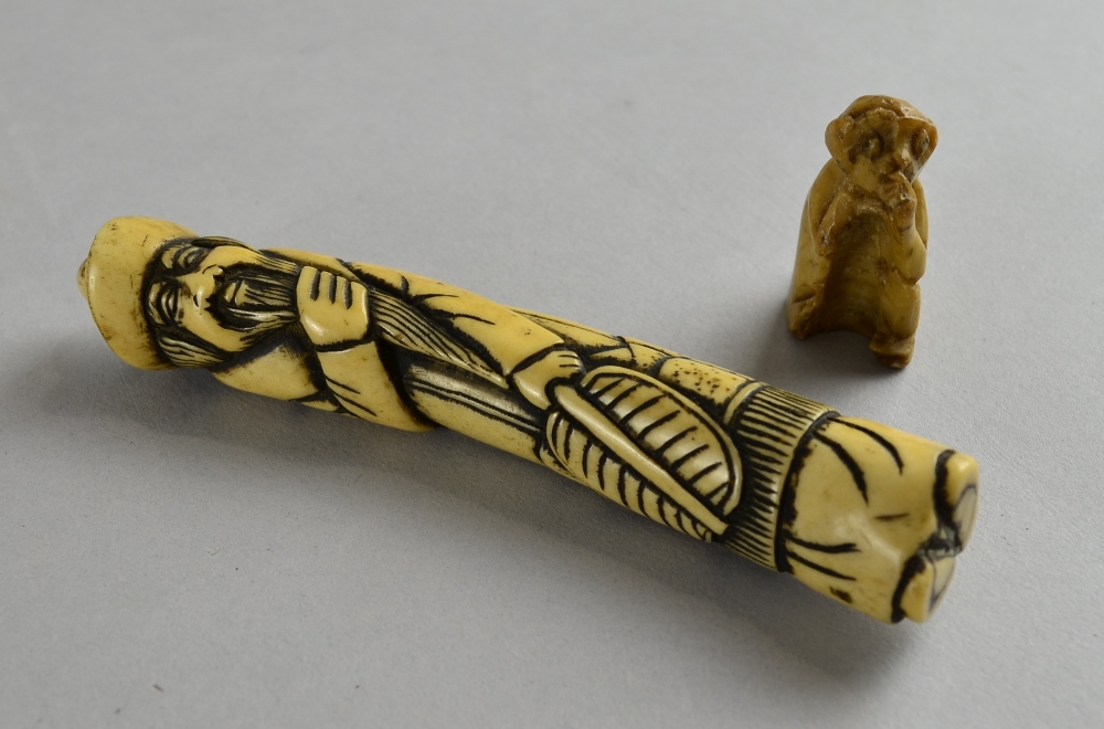 A Japanese Ivory Netsuke designed as 'Lo Fan' with fan and holding his beard Minor crack to the